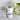 Jar of Rich Moisturizer with flowers on a reflective surface