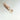 Small tube with a bath salt mixture on a mirror background
