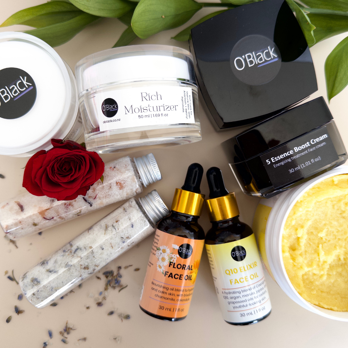 Collection of skincare products with 'O'Black' branding on a light background.