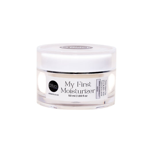 Jar of 'My First Moisturizer' by O'Black on a white background